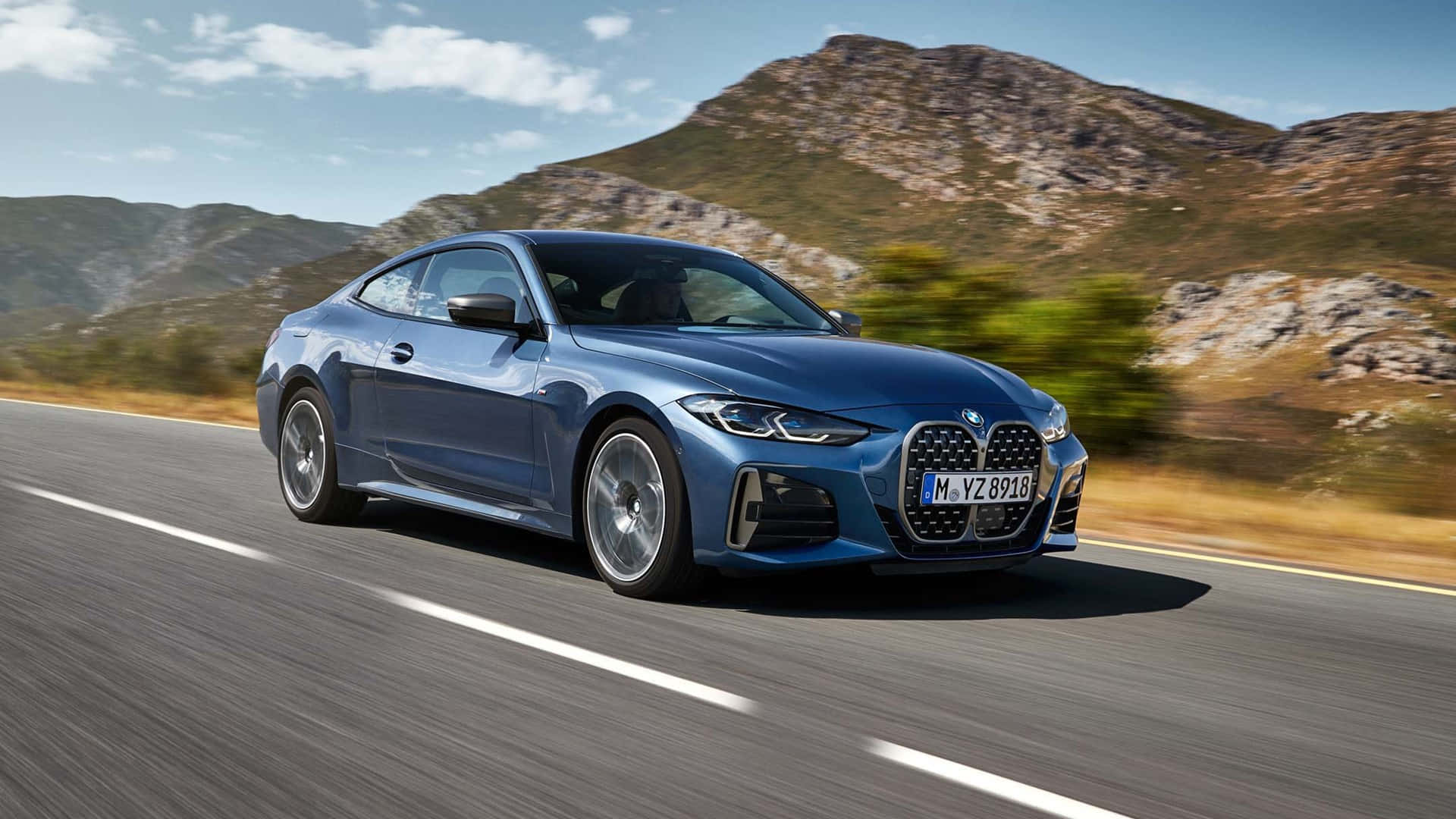 नीली 2021 BMW M4 1920x1080 M सीरीज बैकग्राउंड वॉलपेपर