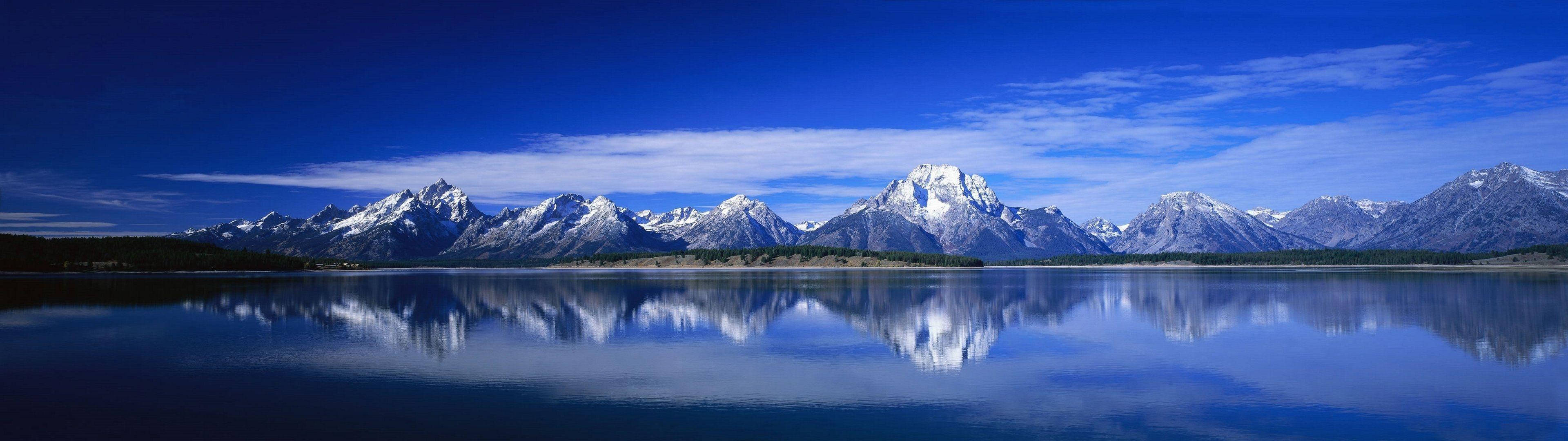 3840x1080 HD डुअल मॉनिटर माउंटेन लेक वॉलपेपर