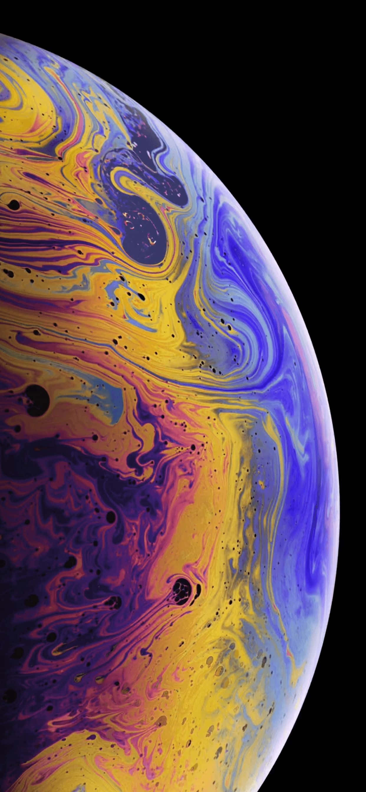 Apple iPhone Xs Max जिसमें स्लीक एज-टू-एज डिज़ाइन और OLED सुपर रेटिना डिस्प्ले है वॉलपेपर
