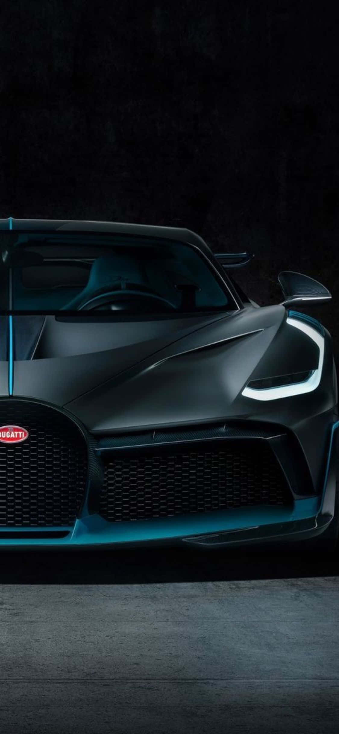 bugatti chiron को एक अंधेरे कमरे में दिखाया गया है वॉलपेपर