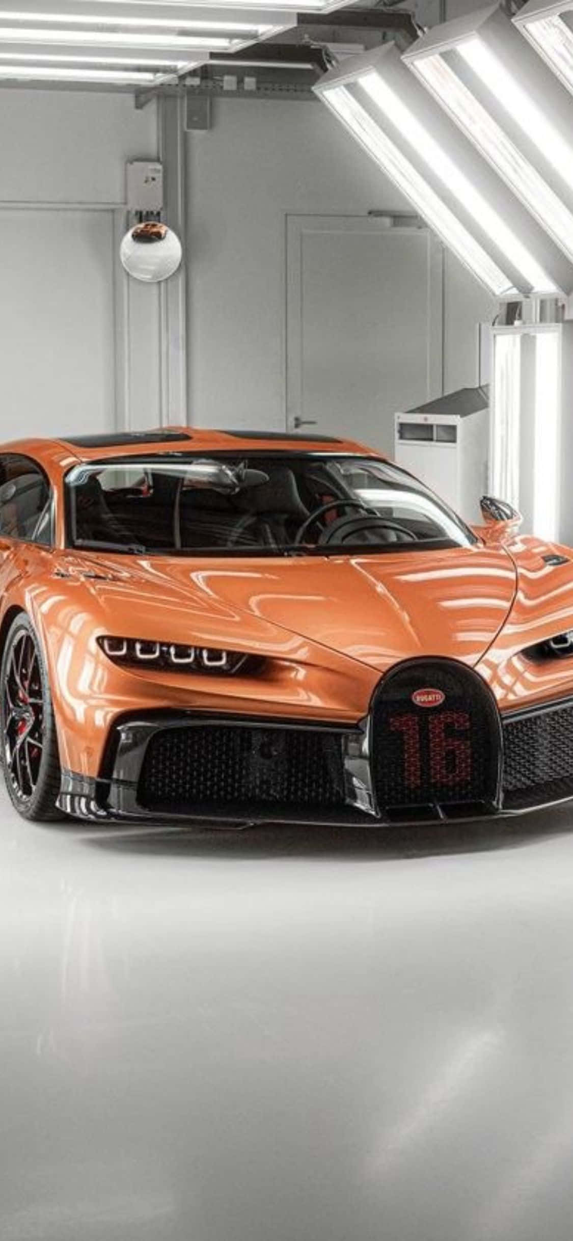 Bugatti शैली के साथ iPhone Xs की शक्ति और गति का उपयोग करें। वॉलपेपर