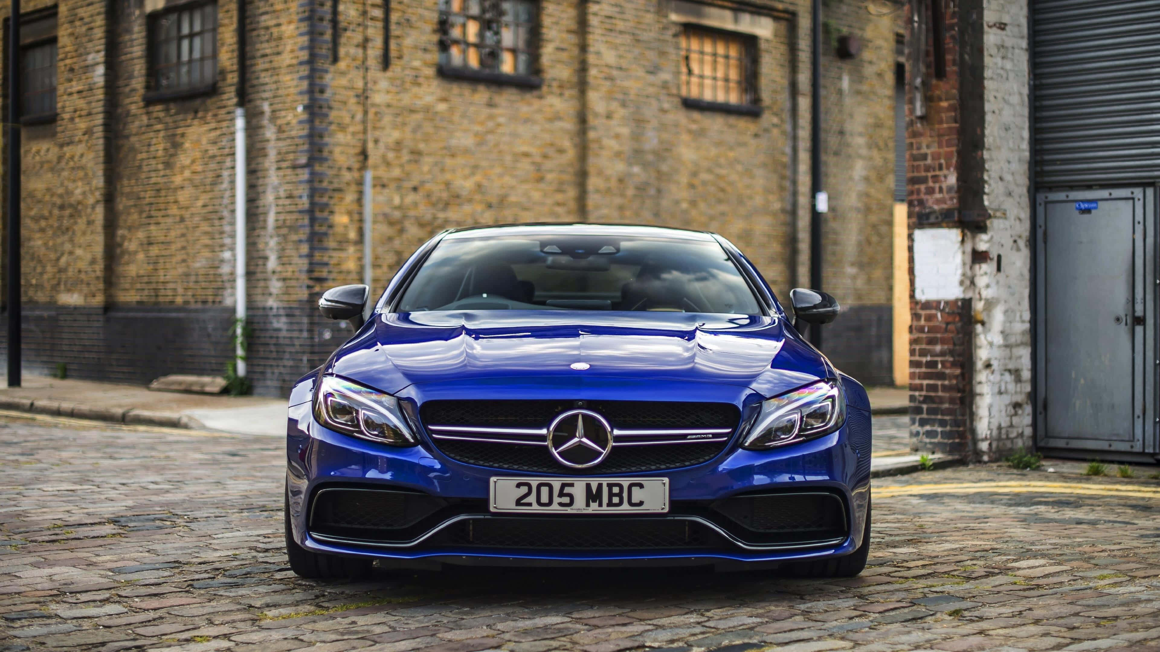 ब्लू C63 AMG मर्सिडीज बेंज 4K वॉलपेपर