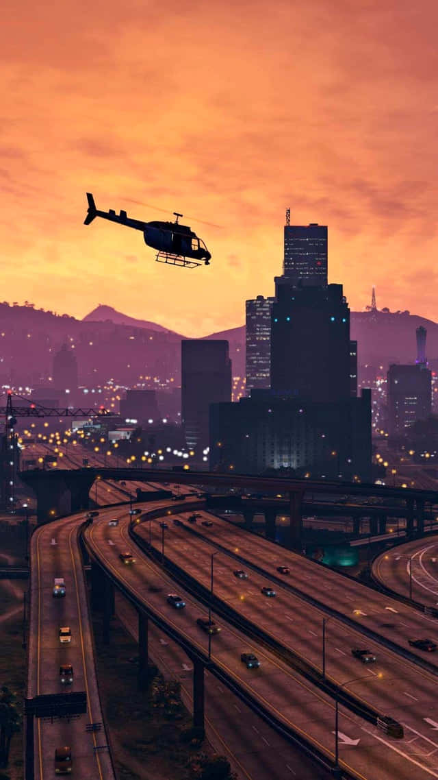 GTA बैकग्राउंड हेलिकॉप्टर लॉस सैंटोस के ऊपर उड़ता हुआ वॉलपेपर