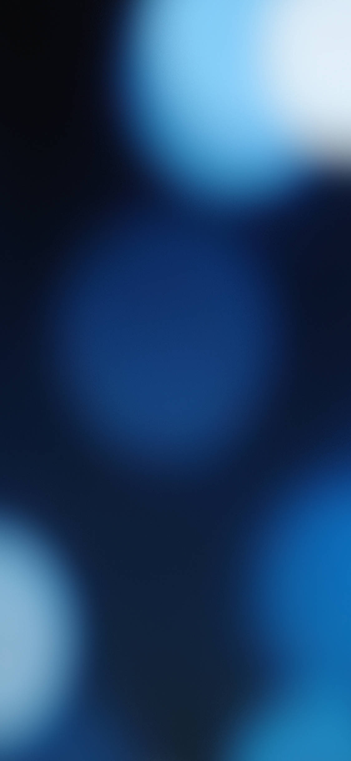 iOS 13 नीली ऑर्ब लाइट्स वॉलपेपर