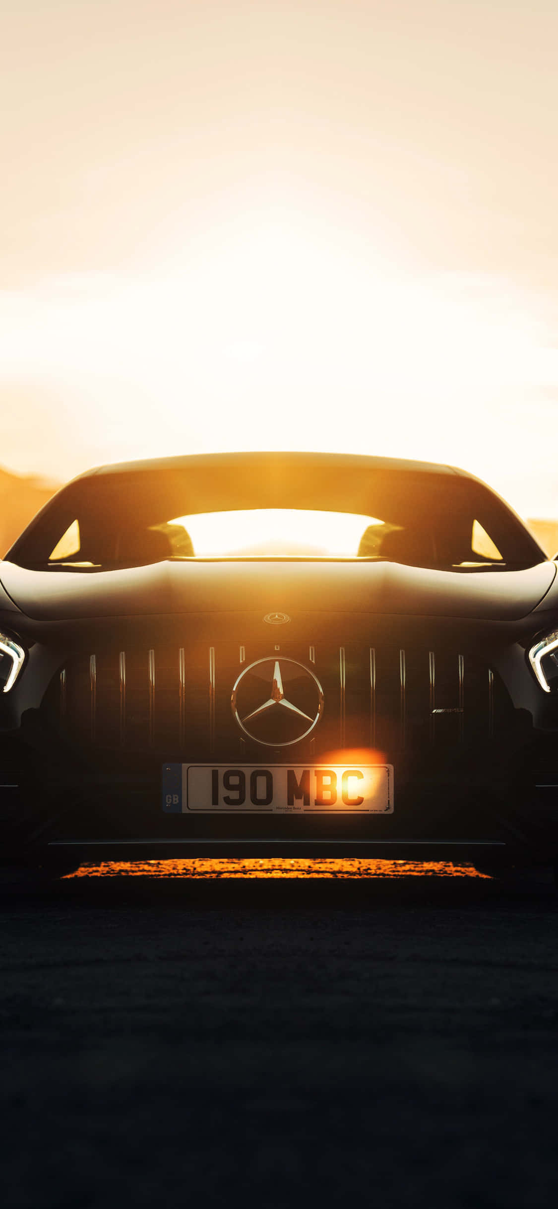 धूप में iPhone X Amg Gt-r पृष्ठभूमि वॉलपेपर