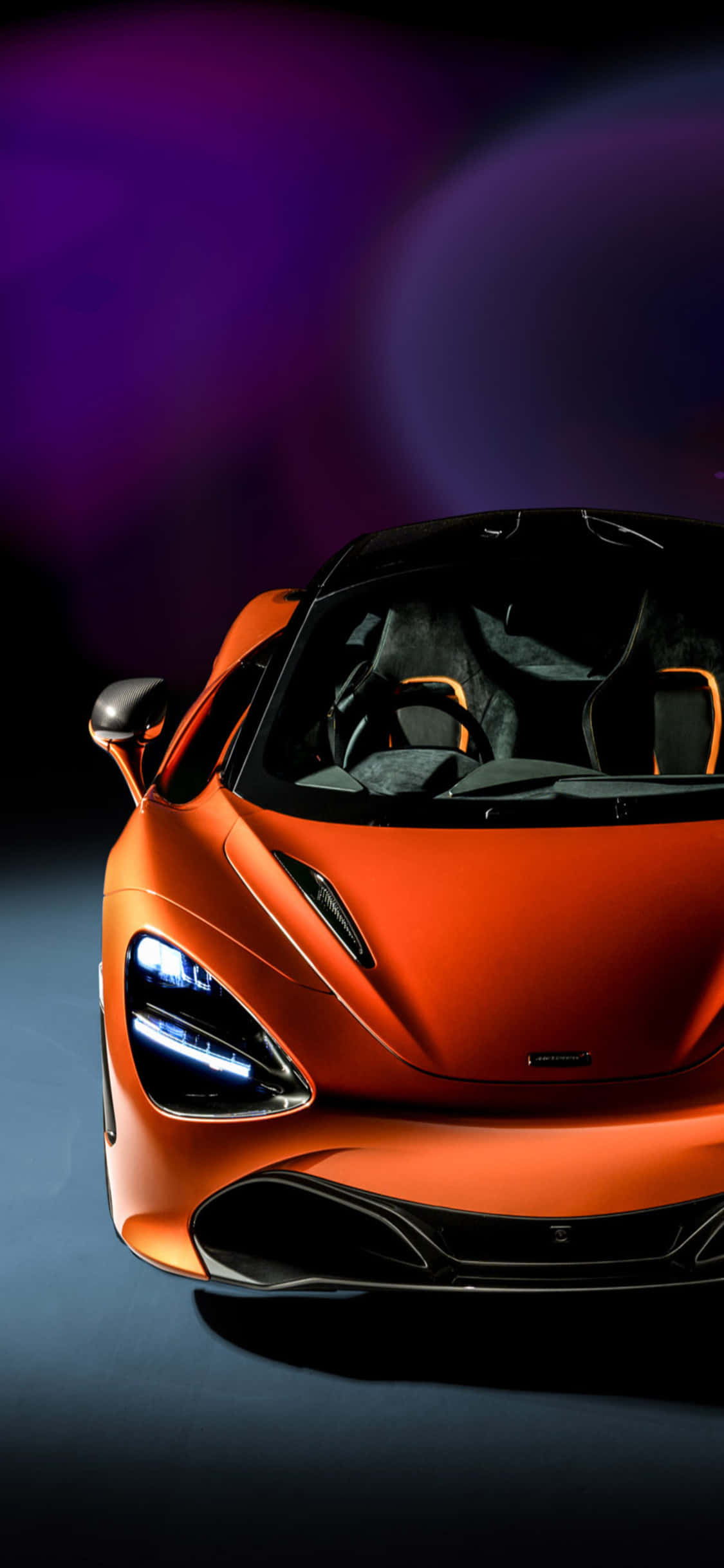 iPhone X McLaren 720s नारंगी स्पोर्ट्स कार पृष्ठभूमि वॉलपेपर
