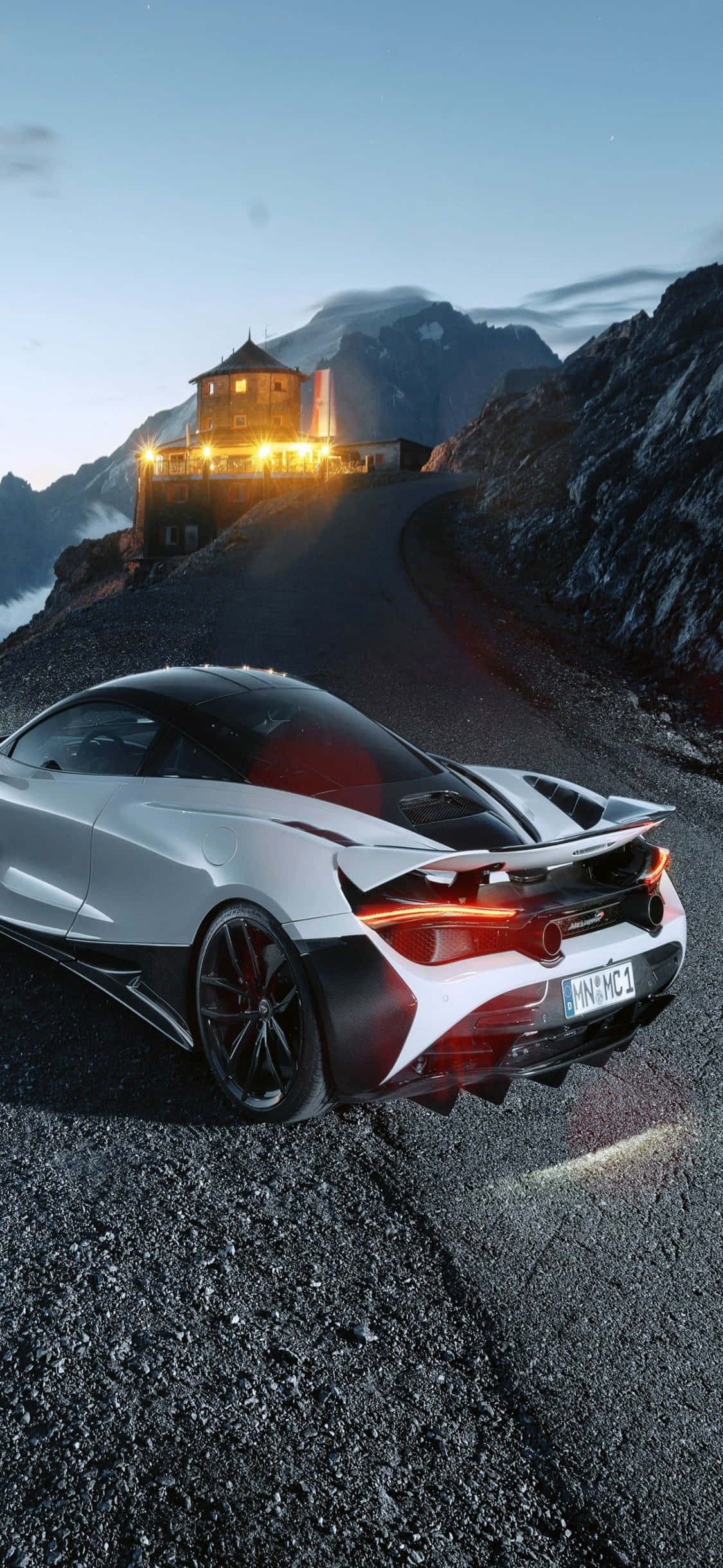 iPhone Xs और McLaren 720s के साथ सर्वश्रेष्ठ के खिलाफ दौड़ें वॉलपेपर
