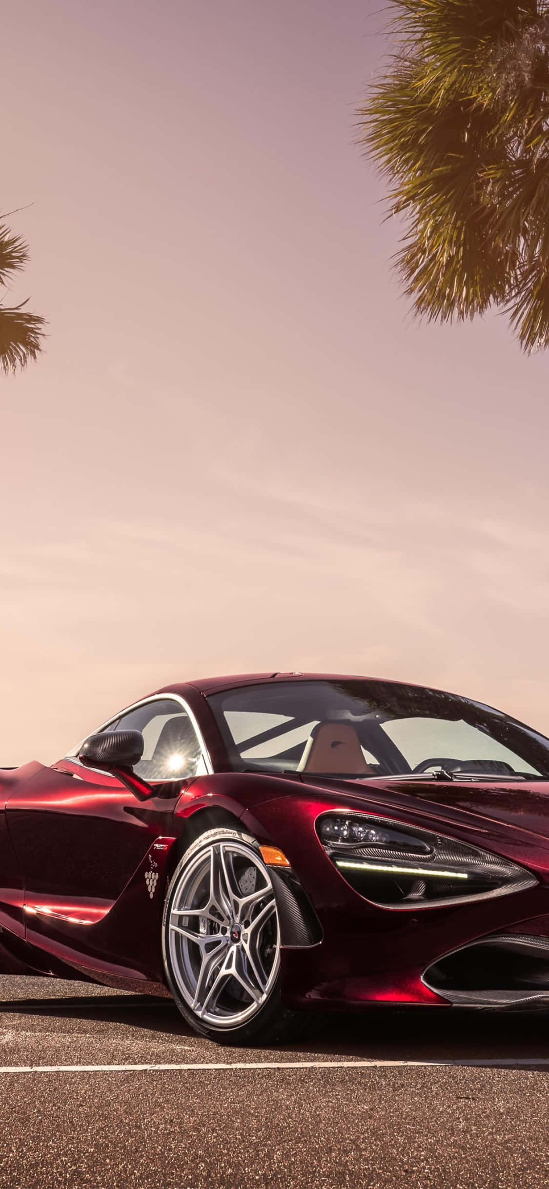 iPhone Xs और Mclaren 720s: लक्ज़री का प्रतीक वॉलपेपर