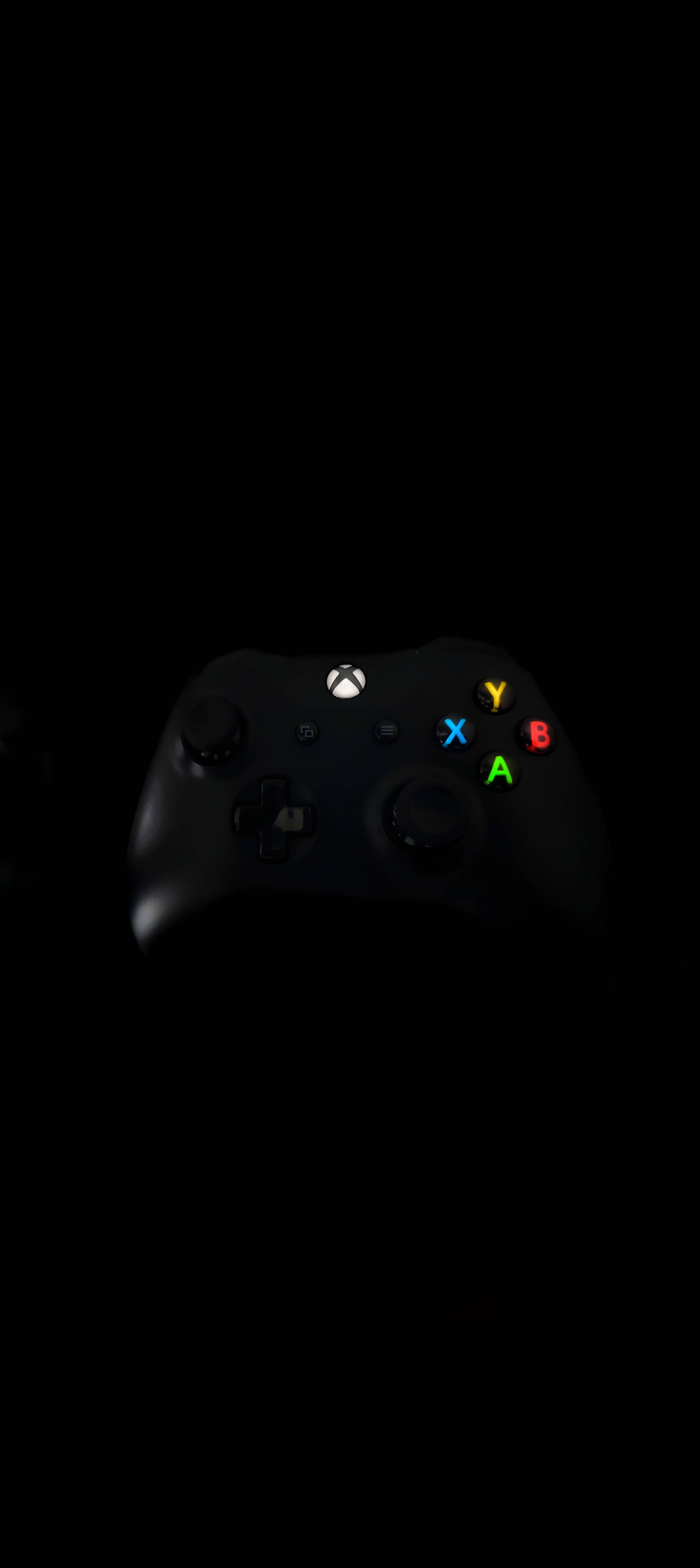 ब्लैक Xbox कंट्रोलर 8K फ़ोन वॉलपेपर