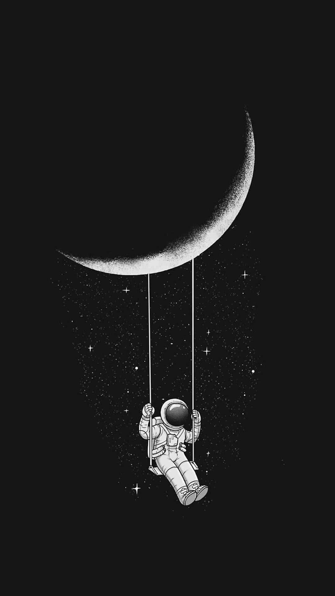 अंतरिक्ष यात्री का अर्धचंद्र पर झूलता सौंदर्य वॉलपेपर