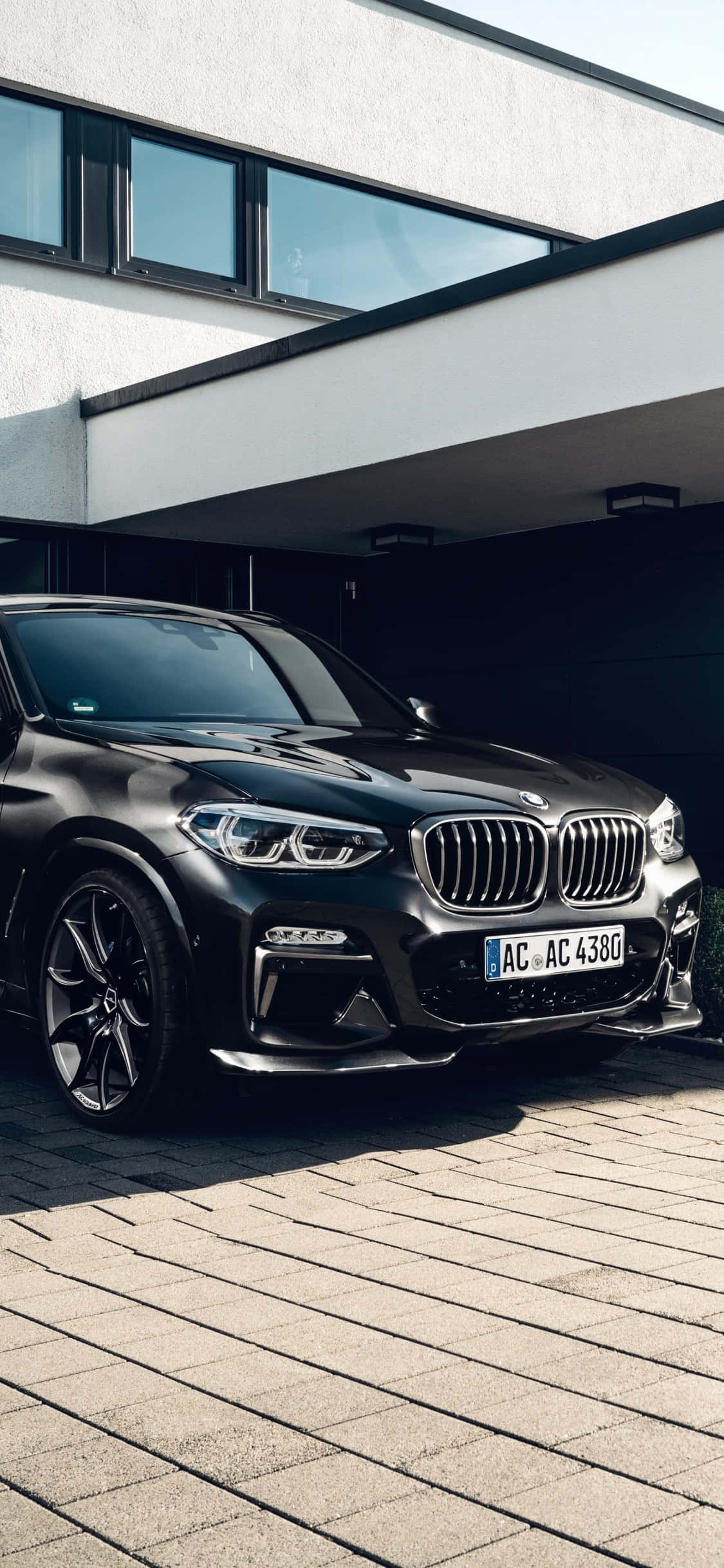 अपनी BMW में एक खूबसूरत ड्राइव, iPhone X द्वारा संचालित वॉलपेपर