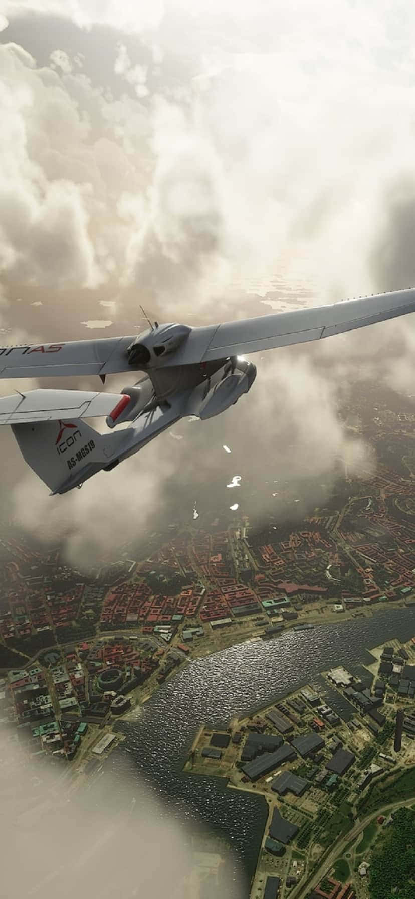 a small plane flying over a city वॉलपेपर