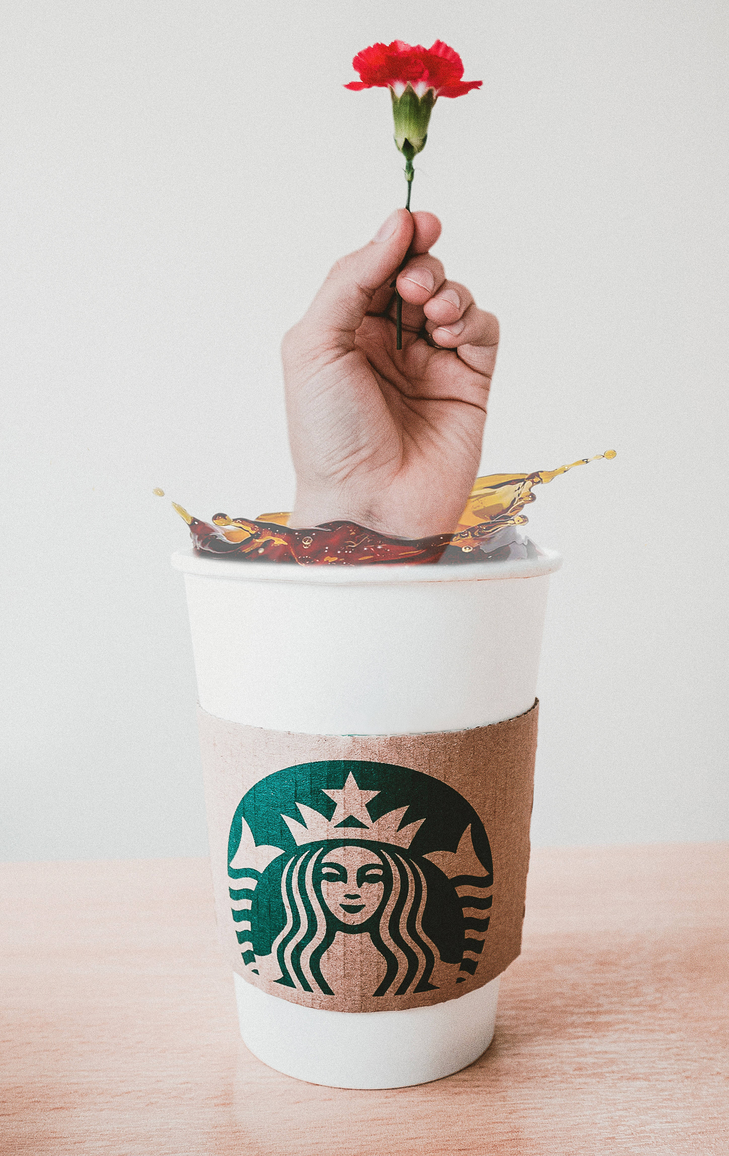 कैप्शन: iPhone पर Starbucks के साथ कॉफी अनुभव को समृद्ध करना वॉलपेपर
