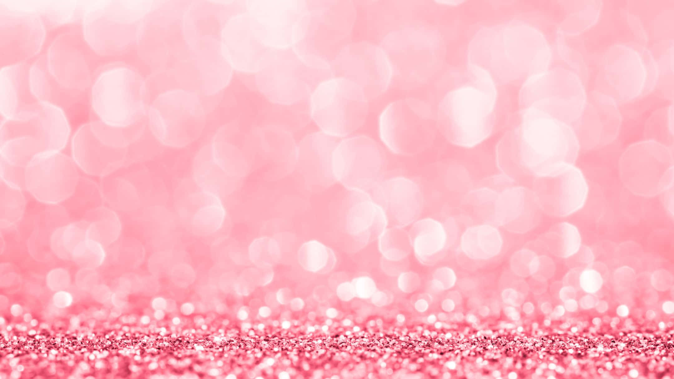 चमकीला गुलाबी बोकेह और ग्लिटर बैकग्राउंड वॉलपेपर