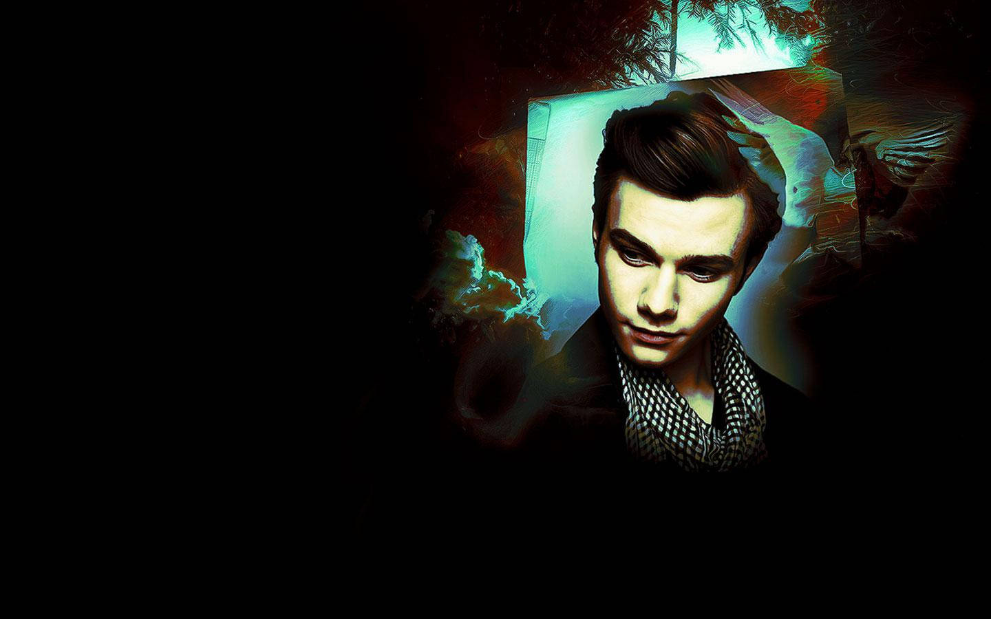 नाटकीय प्रकाश में अभिनेता Chris Colfer वॉलपेपर