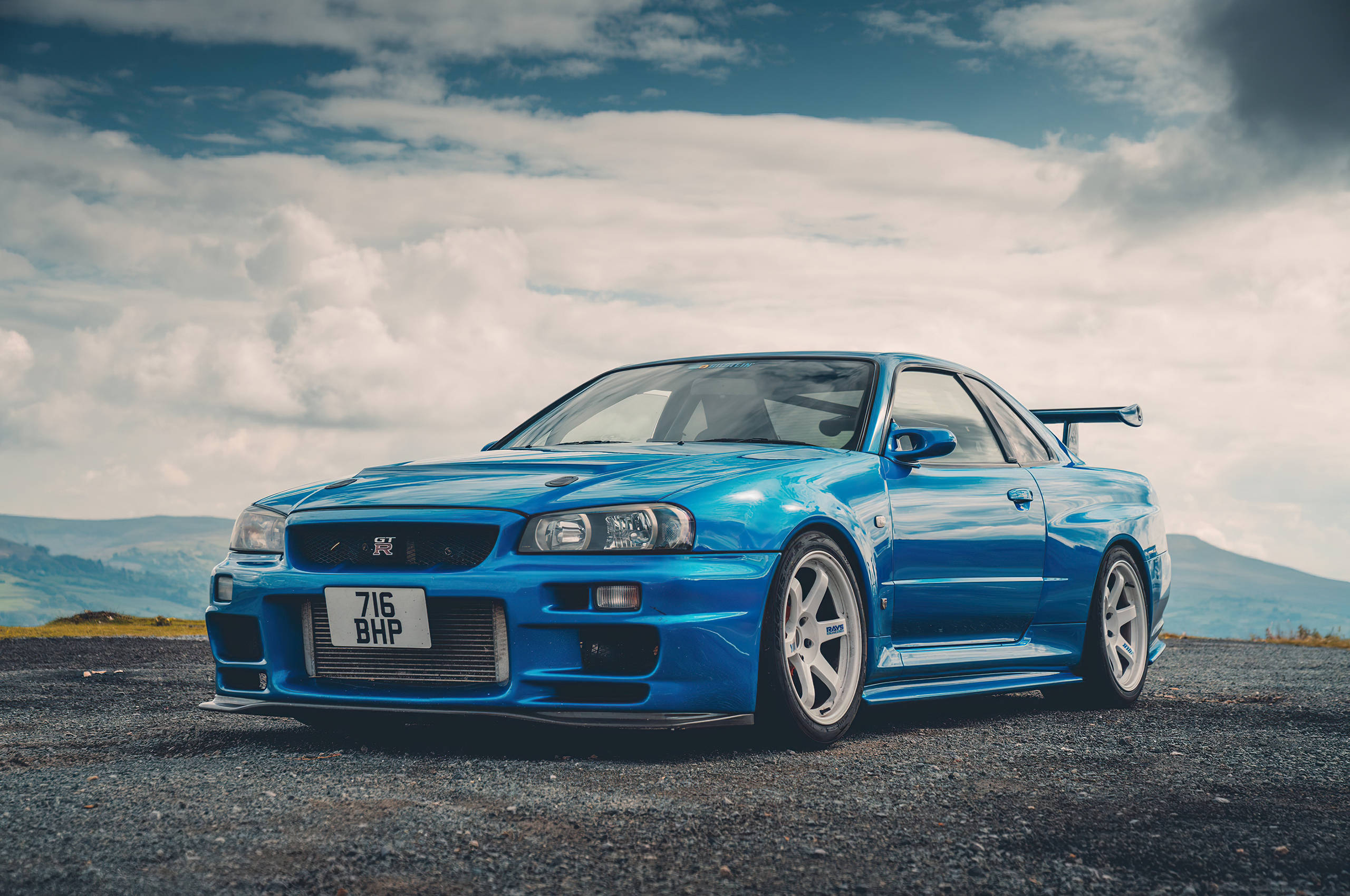 फ़िरोज़ी Nissan Skyline GTR R34 वॉलपेपर