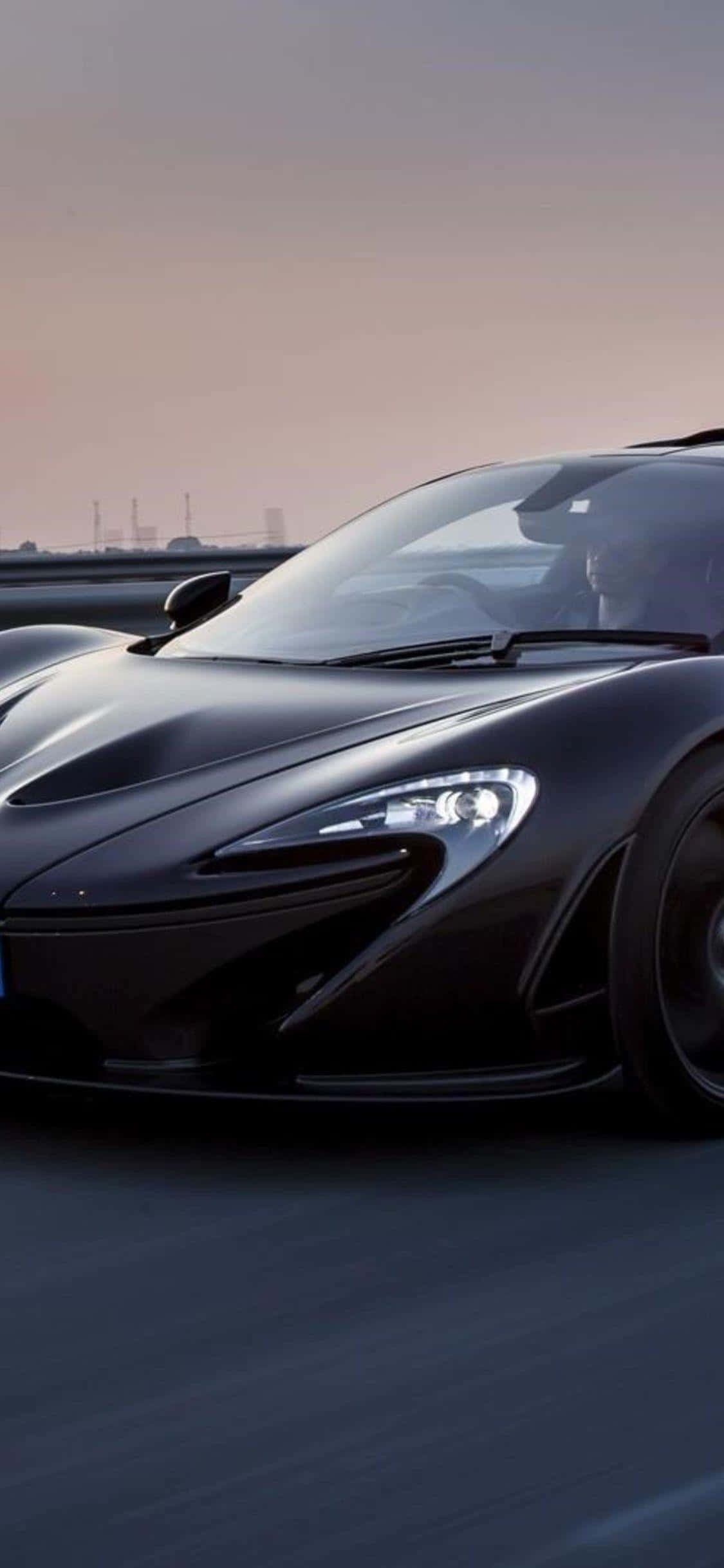 लक्ज़री iPhone Xs Mclaren 720s के पहिए के पीछे बैठें वॉलपेपर