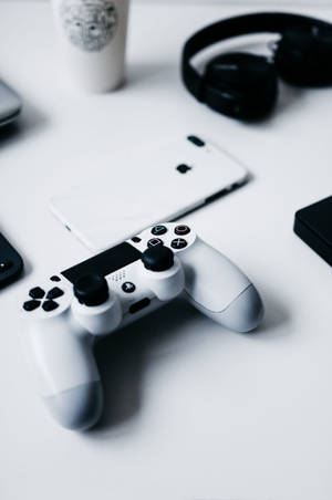 iPhone डेस्क विथ PlayStation कंट्रोलर — 小米 Pad वॉलपेपर