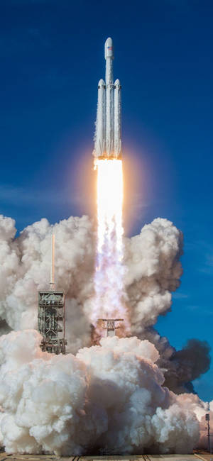 SpaceX फाल्कन हैवी लॉन्च वॉलपेपर — आईफोन 18 प्रो वॉलपेपर