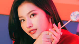 Twice, K-pop सनसनी, अपने शानदार फोटोशूट में चमकती हुई। — 트와이스 वॉलपेपर