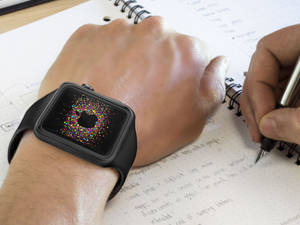 काले सिलिकॉन पट्टी के साथ Apple Watch वॉलपेपर