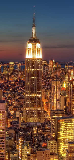 iPhone Xs NYC शहर पृष्ठभूमि — आईफोन 16 प्रो वॉलपेपर