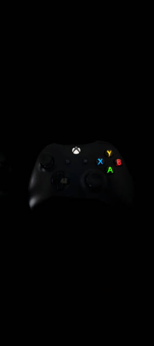 ब्लैक Xbox कंट्रोलर 8K फ़ोन — पिक्सल 10 वॉलपेपर