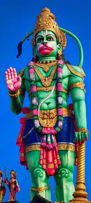 भगवान हनुमान विशाल हरी प्रतिमा — 荣耀 Magic V5 वॉलपेपर